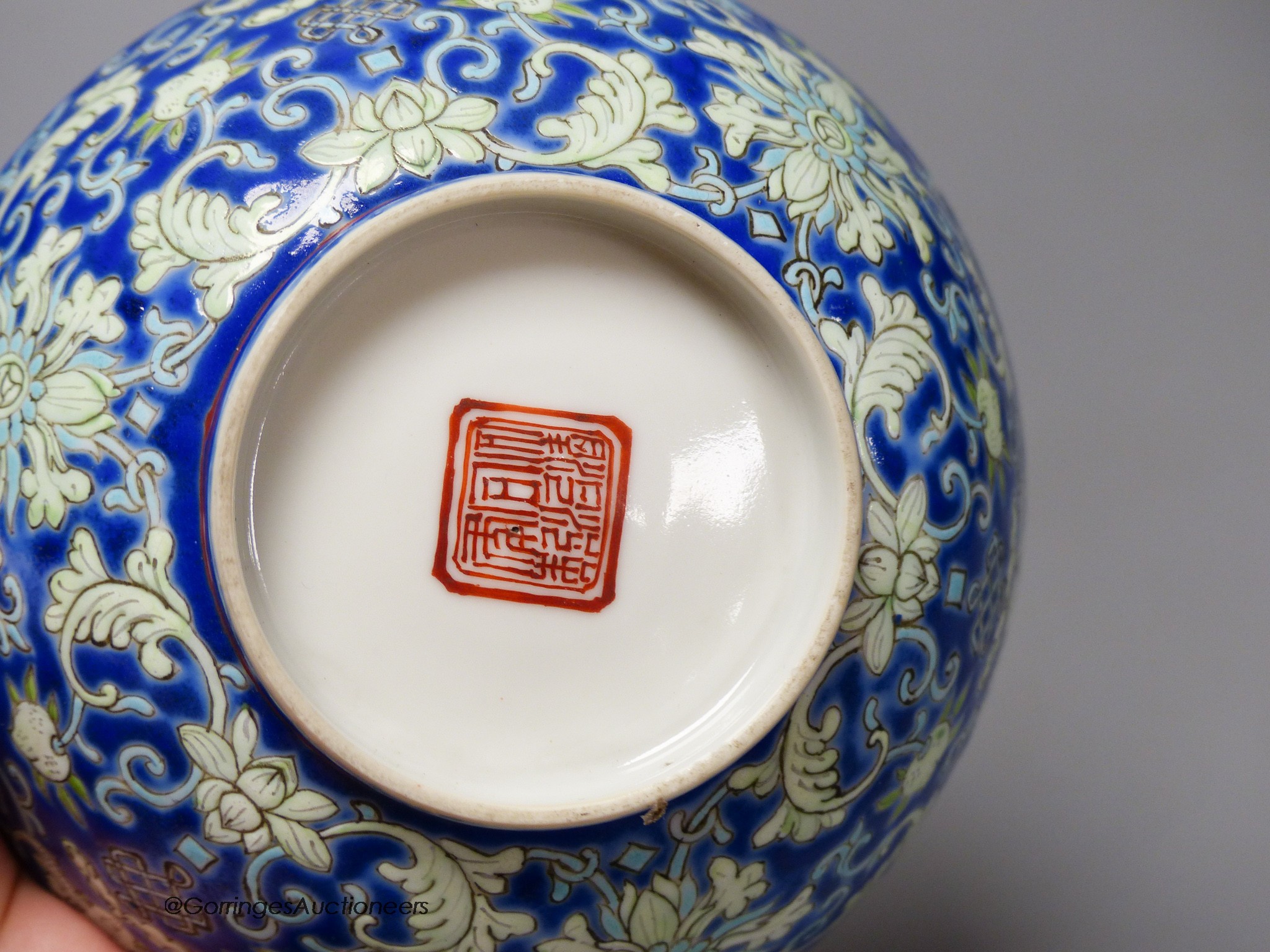 A Chinese blue ground bowl, Tongzhi mark and period (1862-74), 13cm diameter